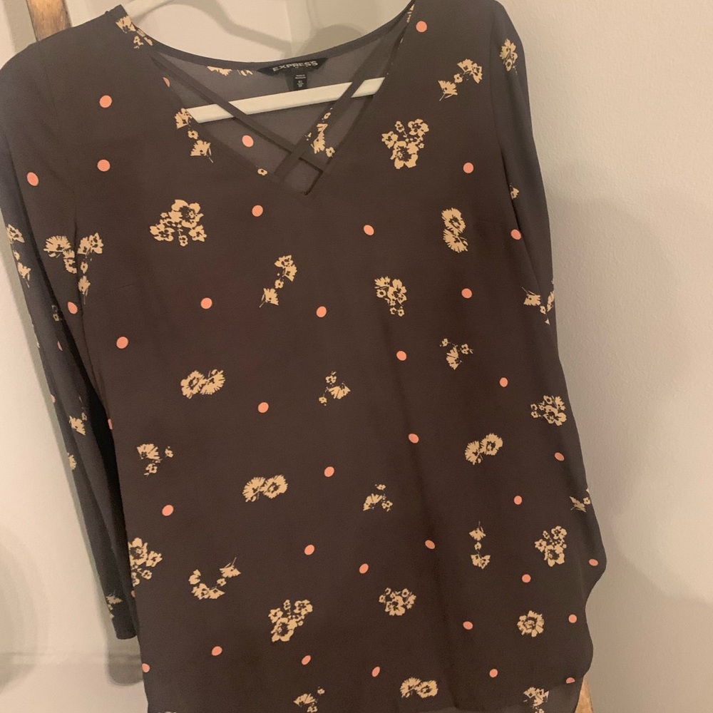 Express floral half button down. Perfect for work. Could be worn as adress.